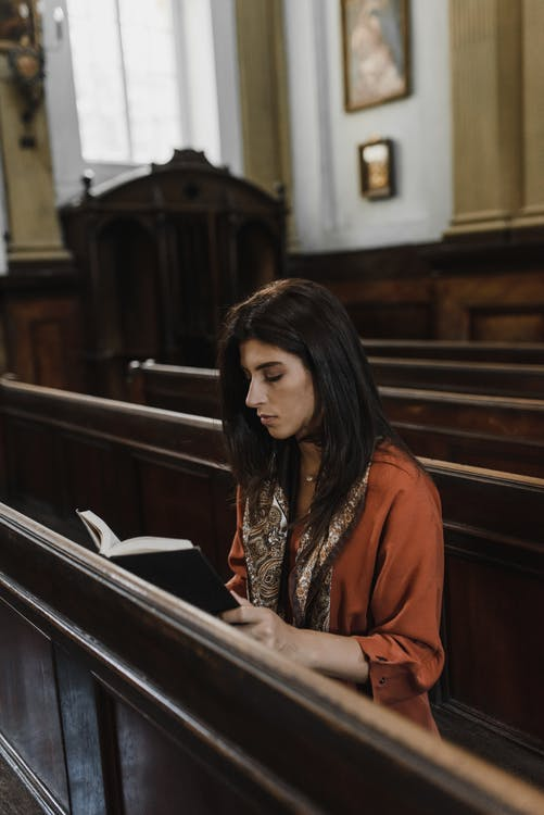 A woman reading the Holy Bible